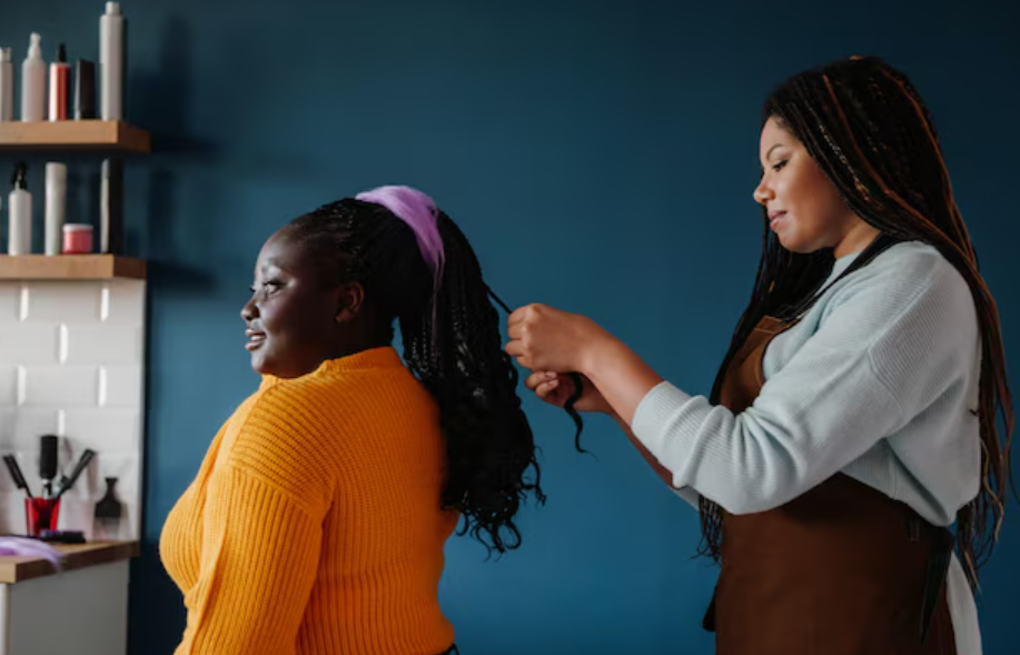 Getting Box braids for hair growth in a salon